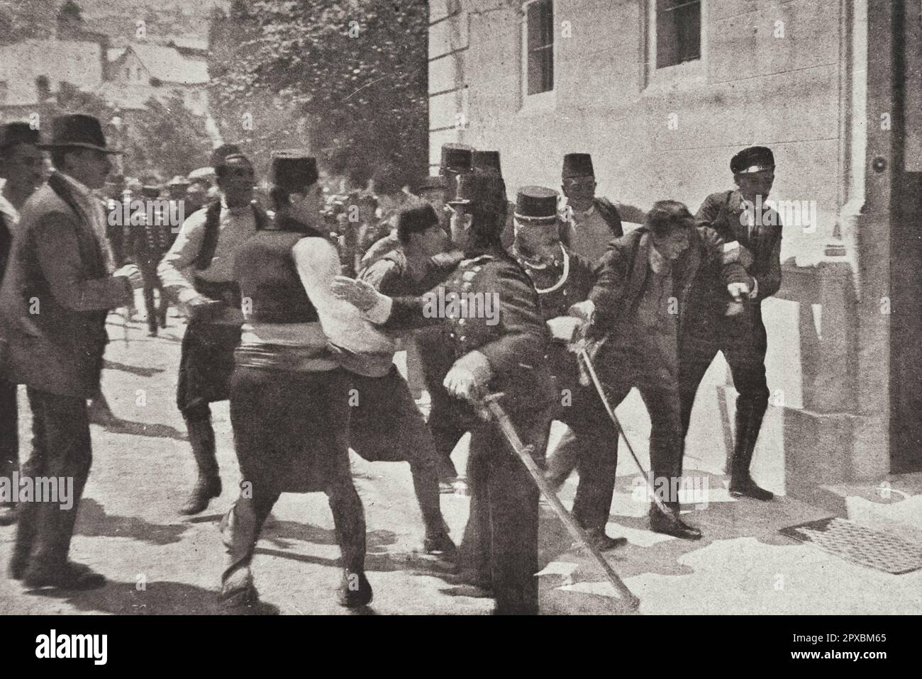 World War I. Sarajevo. Assassination of Archduke Franz Ferdinand. 1914  The drama accomplished, the public force and the crowd rush together on the assassin, who is dragged bruised and bleeding to the police station.  Archduke Franz Ferdinand of Austria, heir presumptive to the Austro-Hungarian throne, and his wife, Sophie, Duchess of Hohenberg, were assassinated on 28 June 1914 by Bosnian Serb student Gavrilo Princip. They were shot at close range while being driven through Sarajevo, the provincial capital of Bosnia-Herzegovina, formally annexed by Austria-Hungary in 1908. Stock Photo