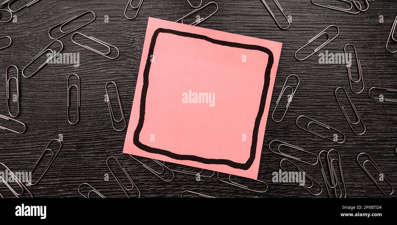 Paperclips Around Important Informations On Desk. Presented Recent Updates. Stock Photo
