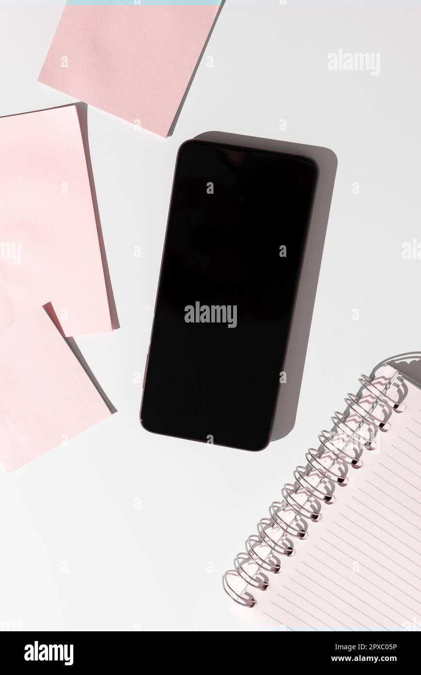 Mobile Phone Screen With Important Ideas On It And Note Sticked On desk ...