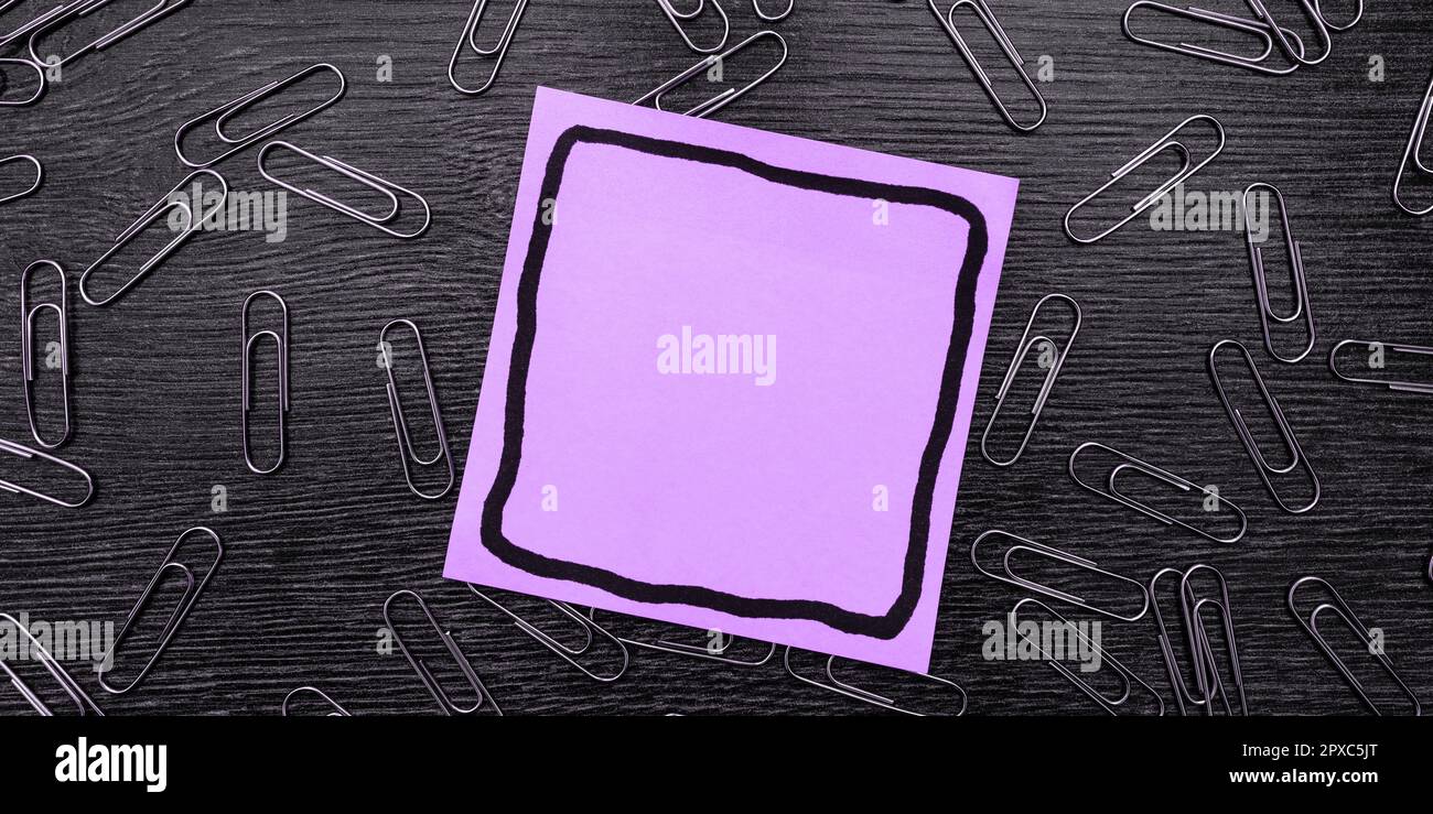 Paperclips Around Important Informations On Desk. Presented Recent Updates. Stock Photo