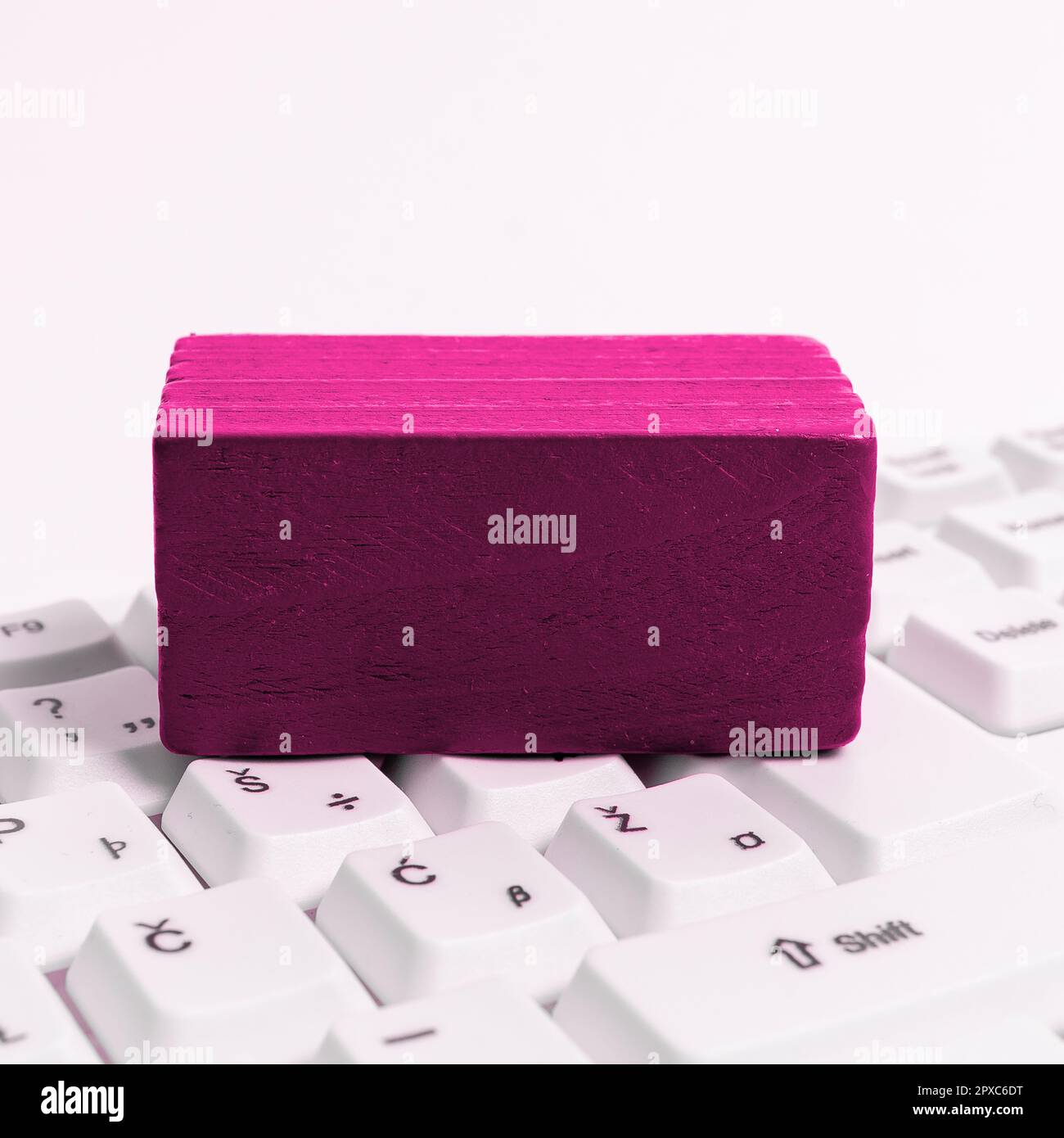 Colored cube with important message lying on keyboard. Main information. Stock Photo