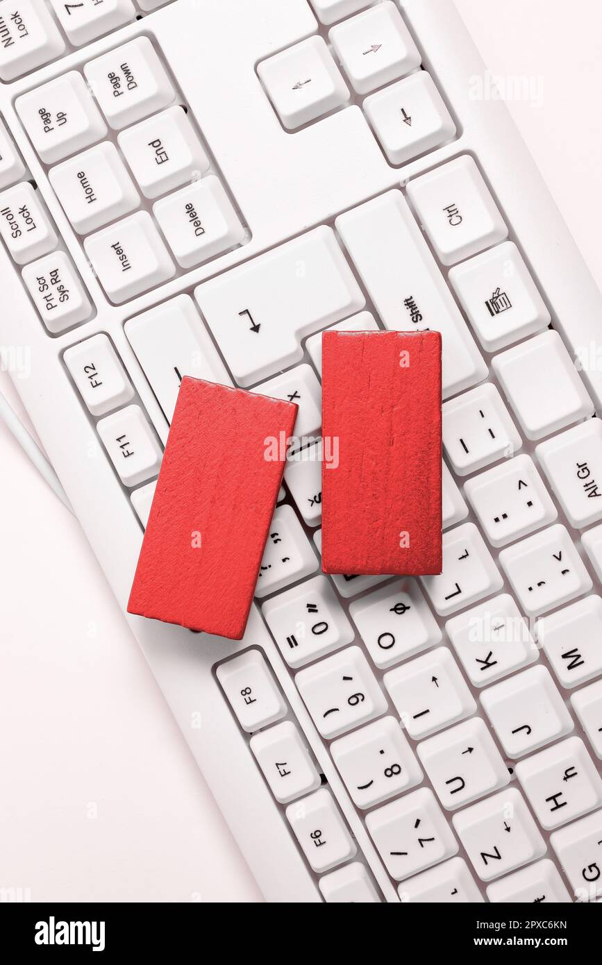 Colored cube with important message lying on keyboard. Main information. Stock Photo