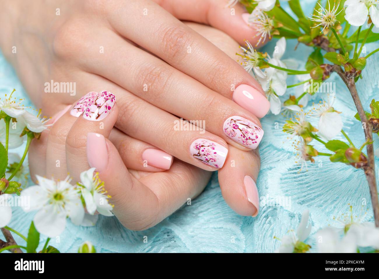 spring manicure for the bride in gentle tones with flowers nail design 2PXCAYM
