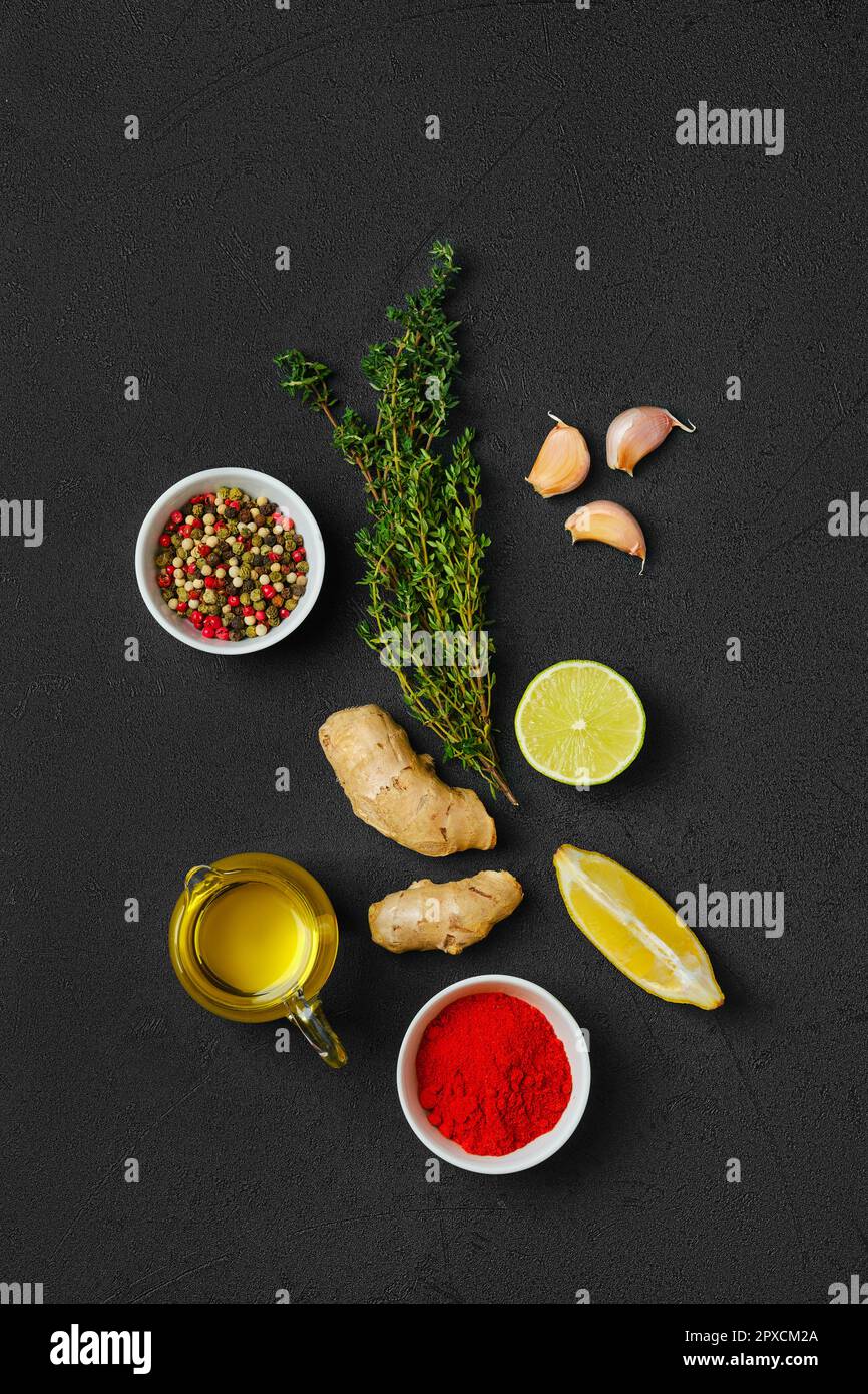 Composition with condiments on black background. All purpose spice, Stock Photo