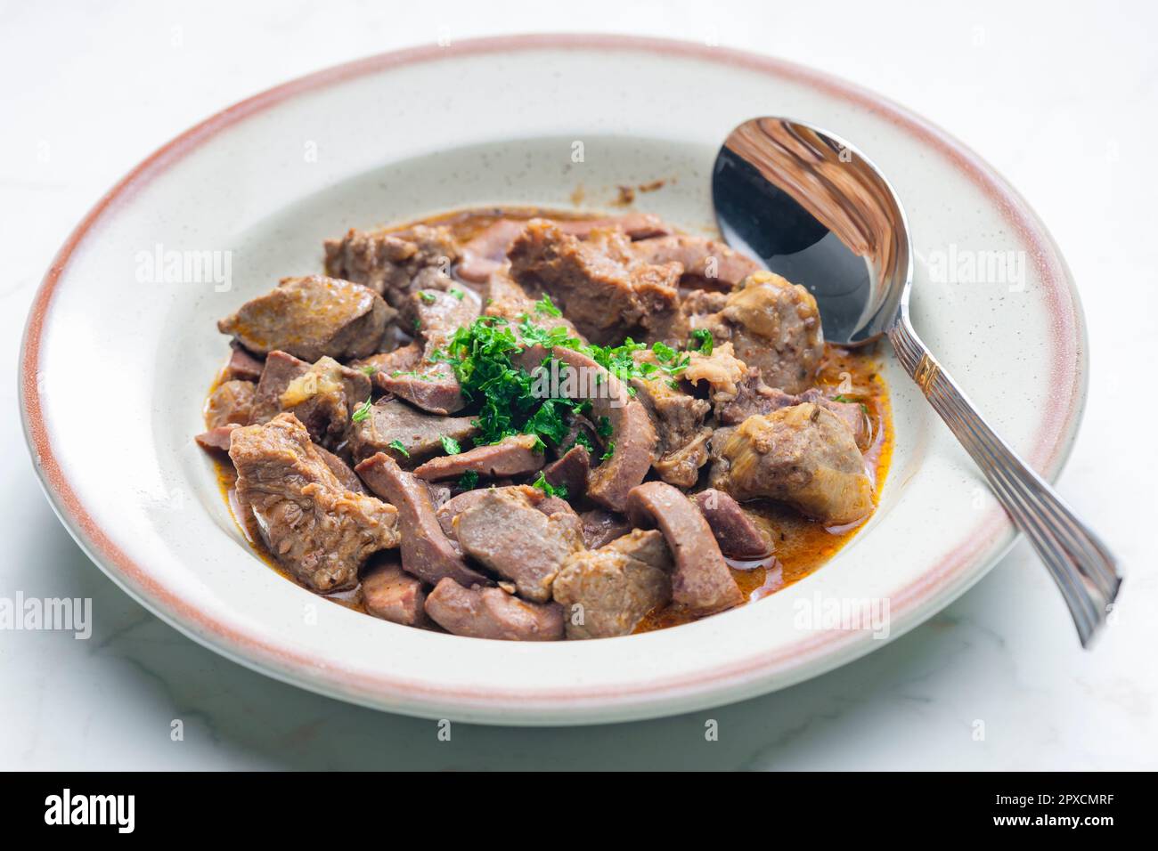 stew of meat, livers and kidneys Stock Photo Alamy