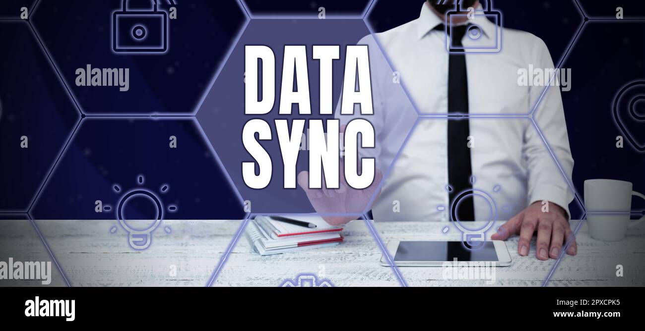 Writing displaying text Data Sync, Concept meaning data that is continuously generated by different sources Stock Photo