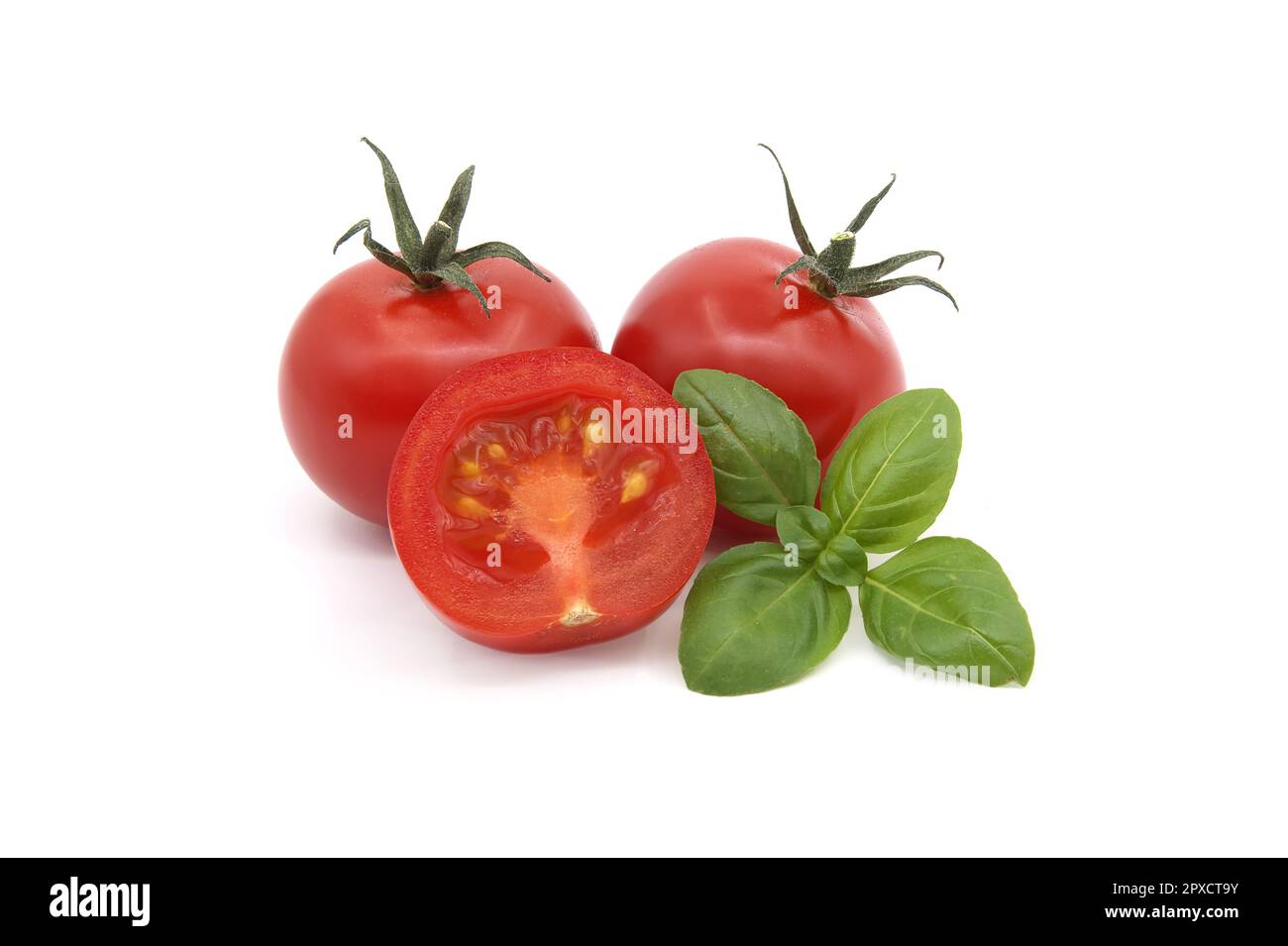 Cherry tomatoes with basil leaves isolated on white background Stock ...