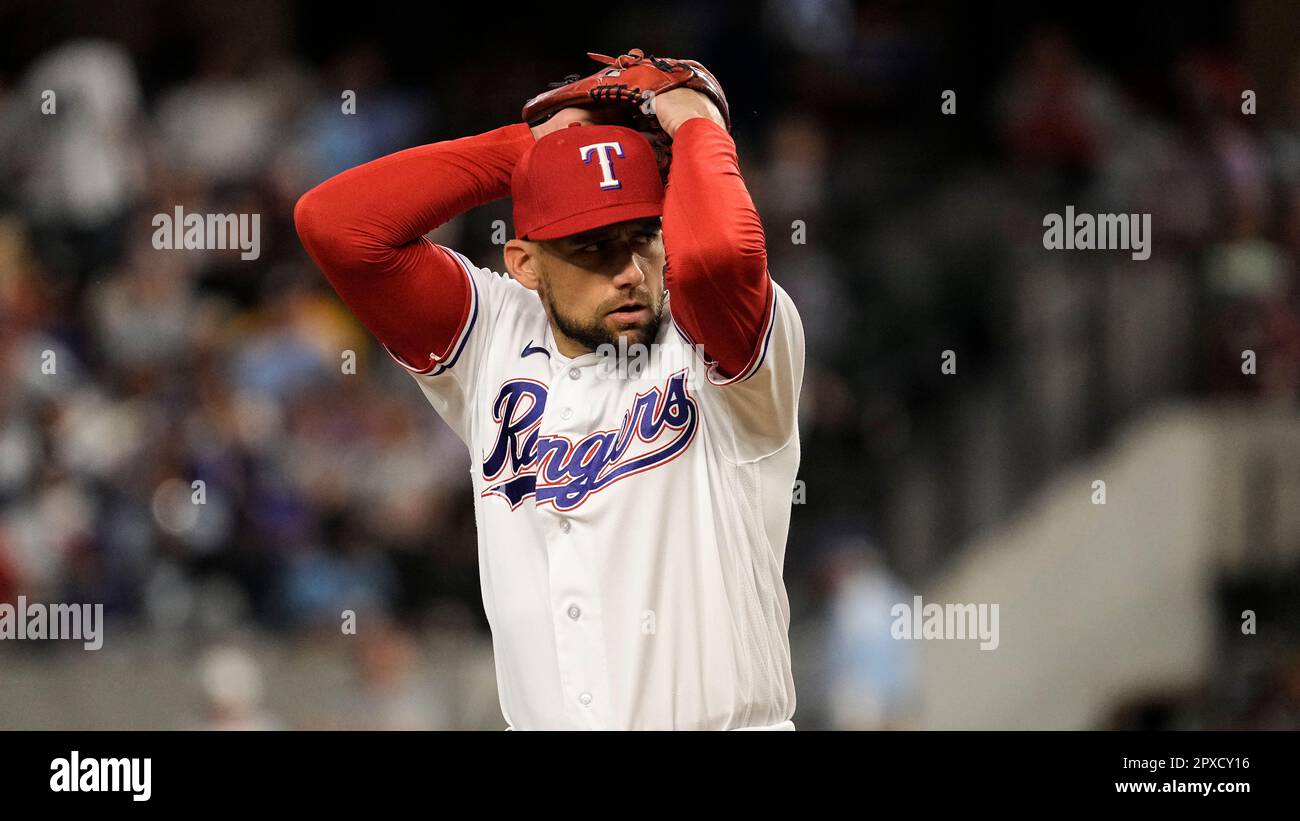 Texas Rangers starting pitcher Nathan Eovaldi prepares to pitch during the  third inning of a baseball game against the New York Yankees, Saturday,  April 29, 2023, in Arlington, Texas. (AP Photo/Sam Hodde