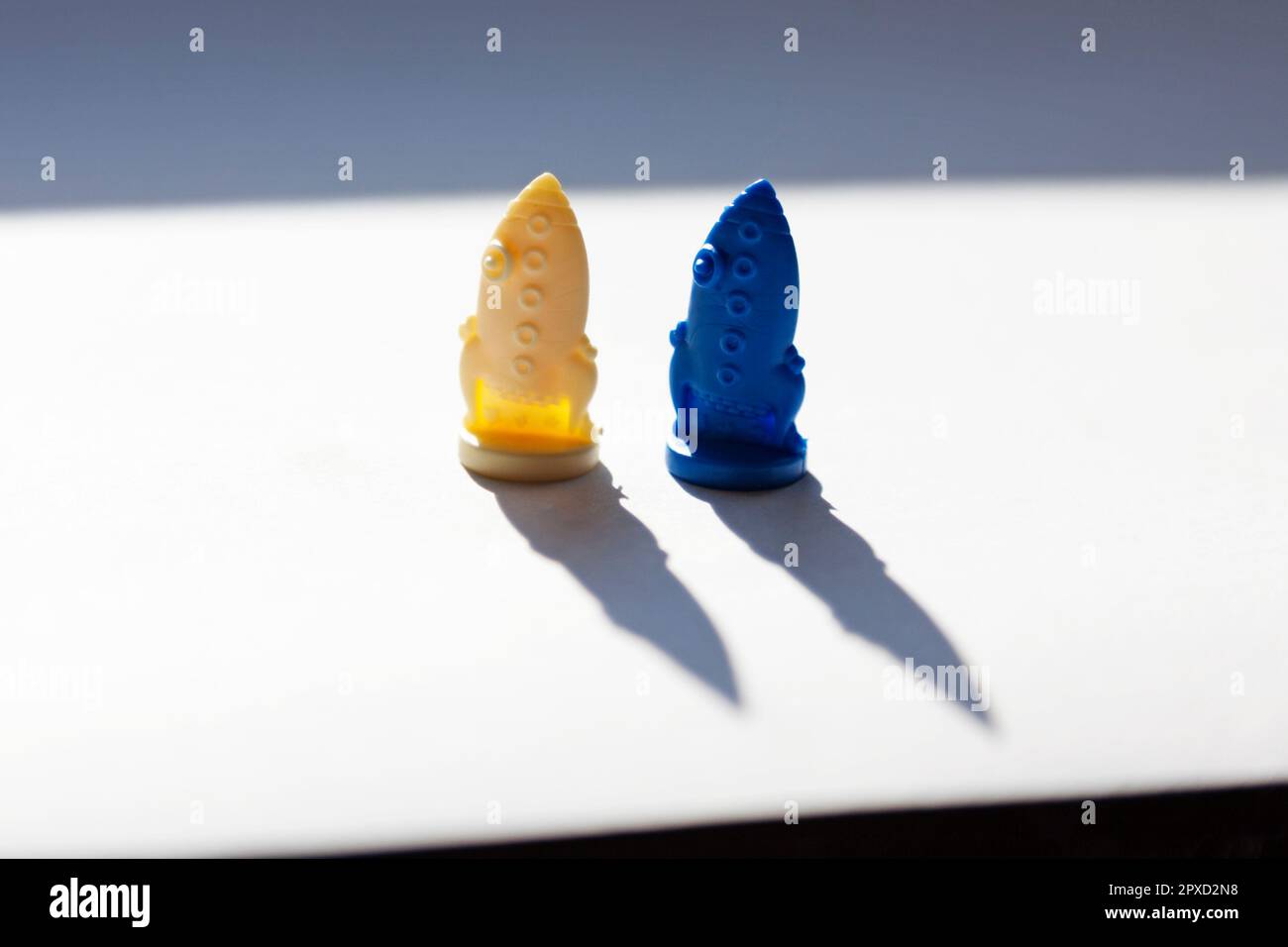 two small plastic toy rockets Stock Photo Alamy