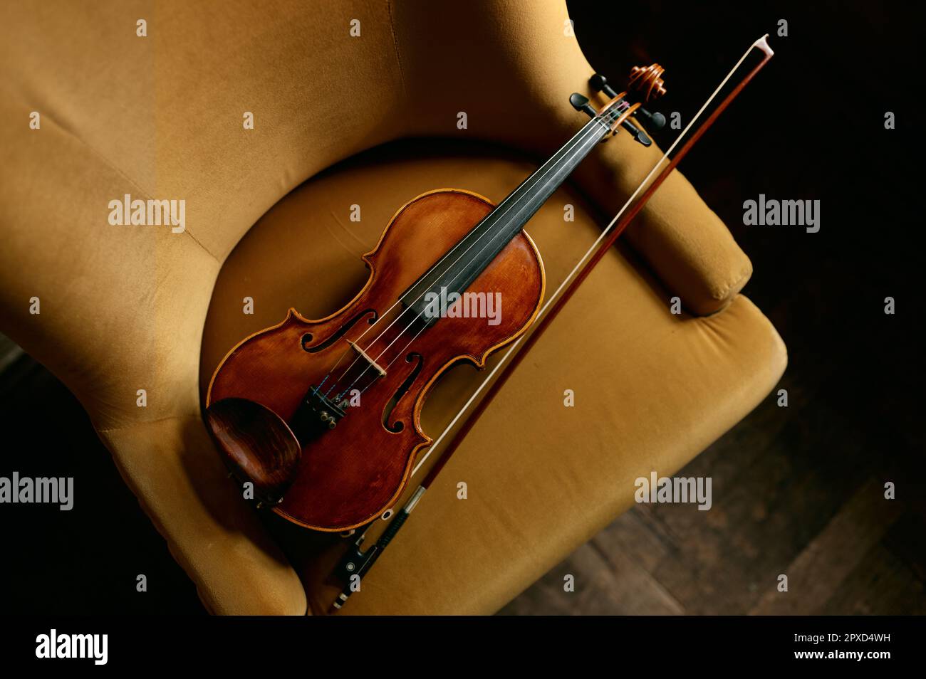 Violin musical instrument on the chair. Violinist equipment for music