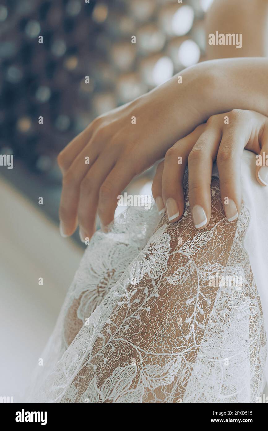 Closeup Photo of a Bridal Dress Details with Gorgeous White Lace