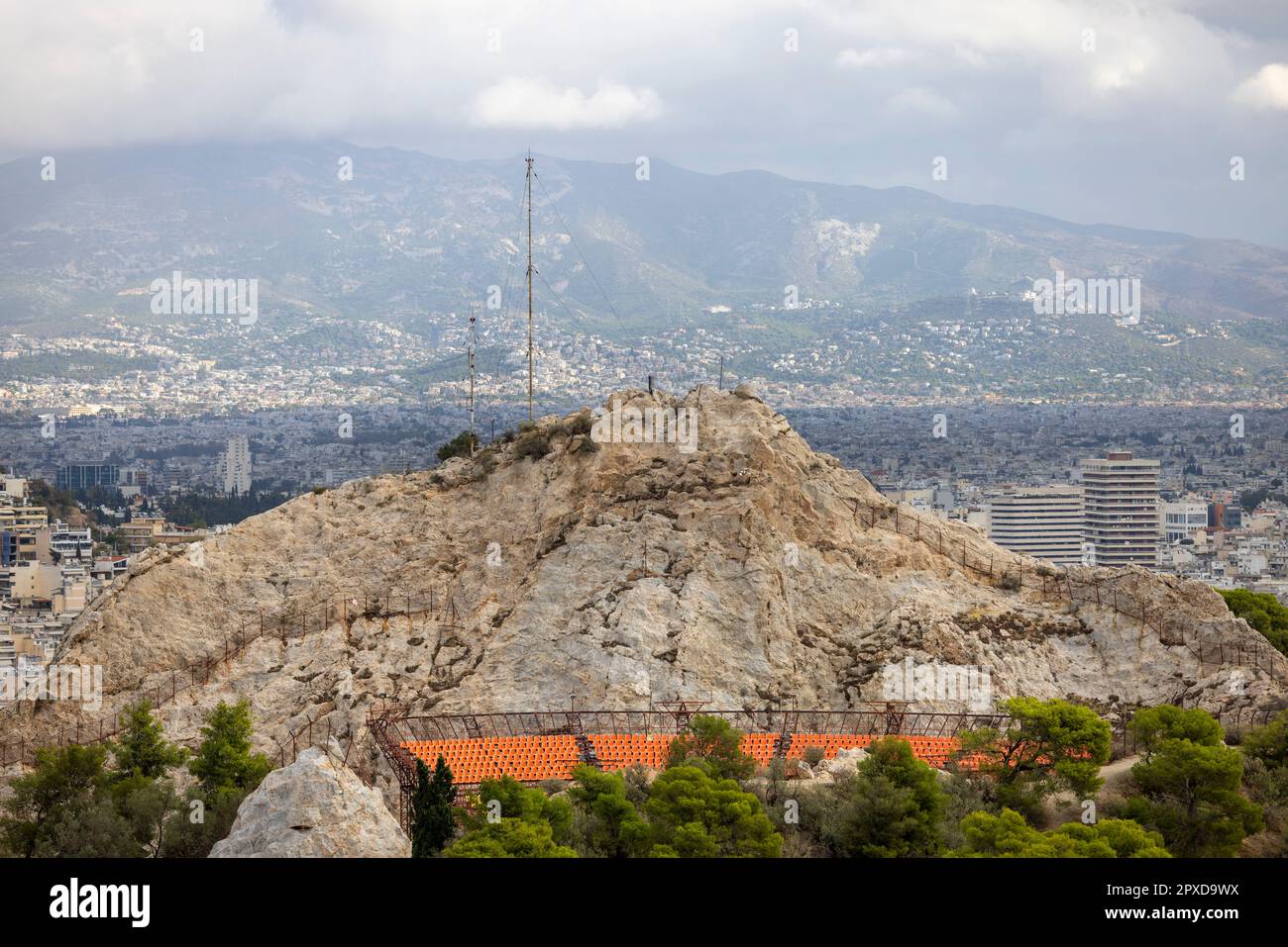 View from observation deck of Mount Lycabettus of open-air amphitheater, Lycabettus Theatre, Athens, Greece. Panorama of the city in the distance Stock Photo
