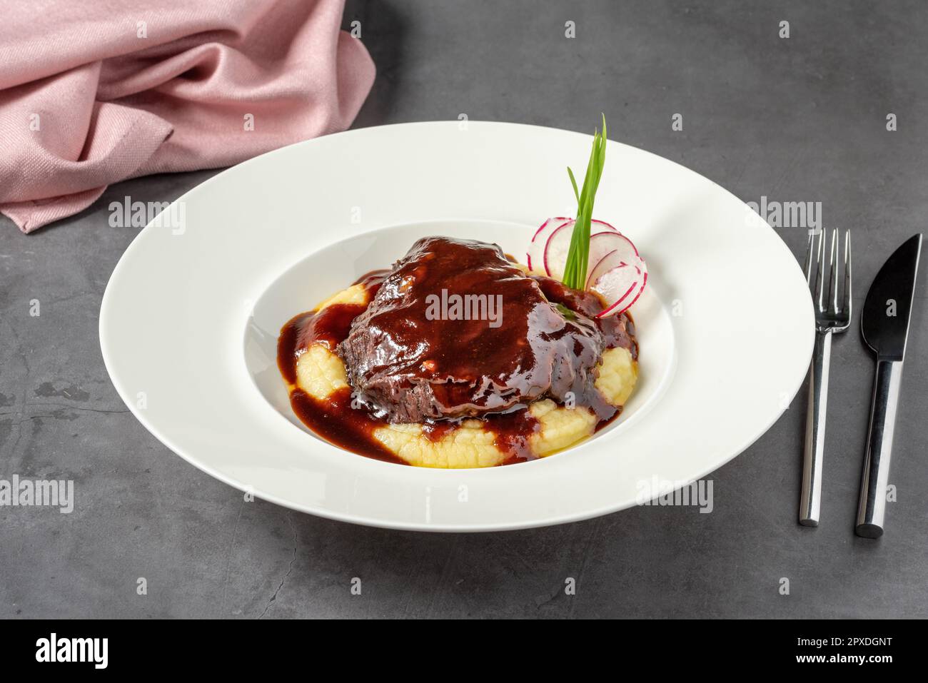 Veal cheek served in a fine dining restaurant Stock Photo