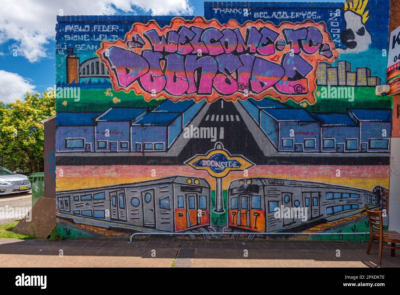 A 2002 mural artwork titled Welcome to Doonside Stock Photo