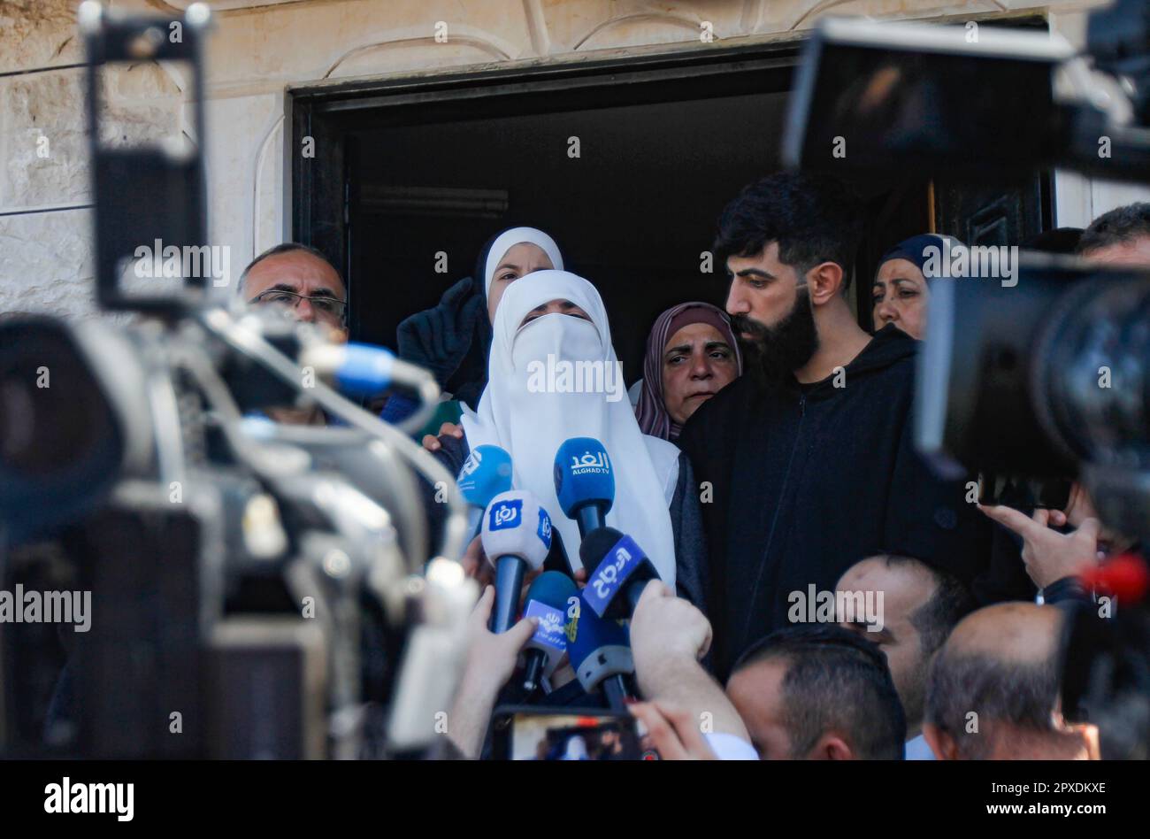 Randa (C), the wife of the Palestinian Khader Adnan, an activist in the