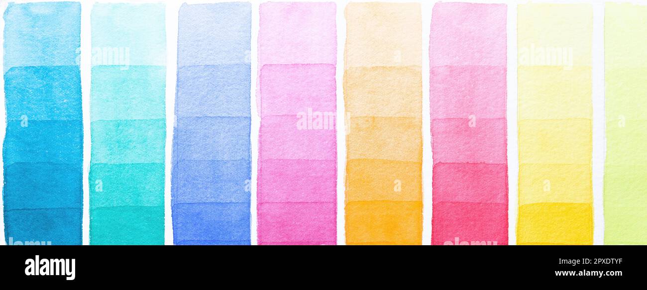 Palette of shades watercolors different colors painted on white paper