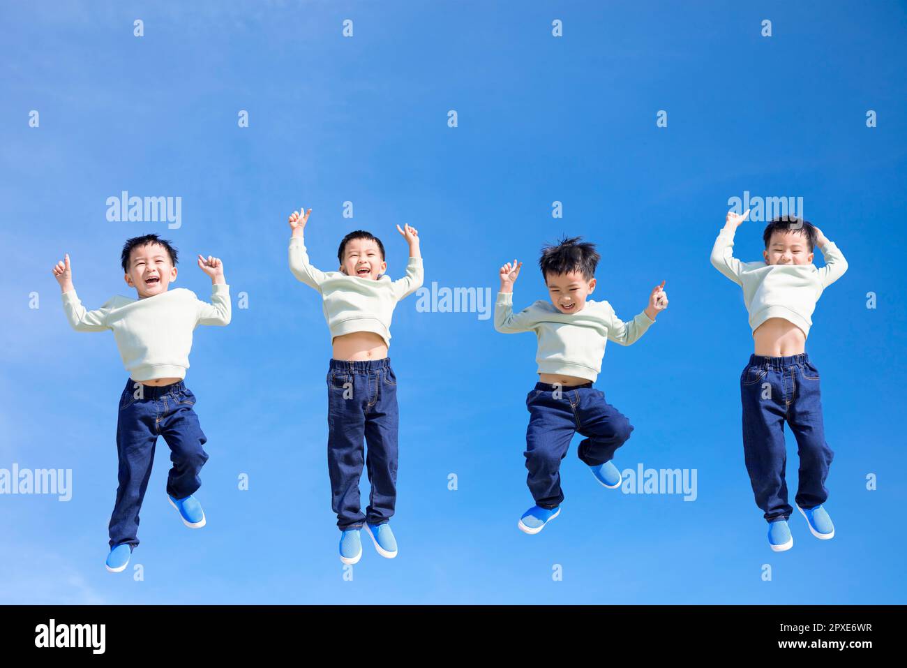 Asian jumping happy sky hi-res stock photography and images - Alamy