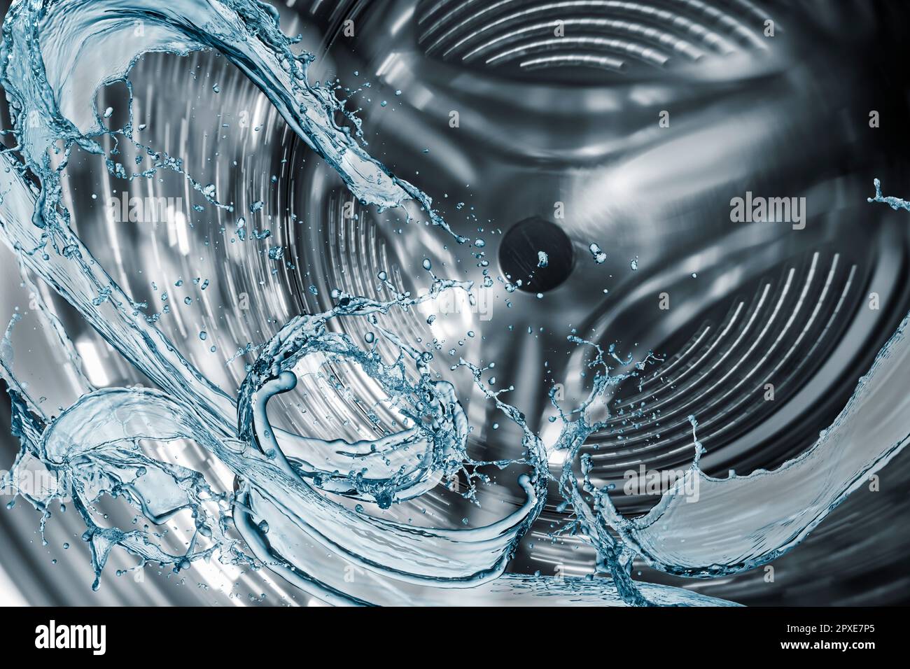 Washing machine drum with water splash Stock Photo Alamy