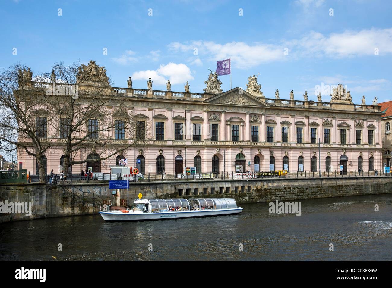 southern facade of the German Historical Museum in the baroque Zeughaus on Unter den Linden boulevard, canal of the river Spree, district Mitte, Berli Stock Photo