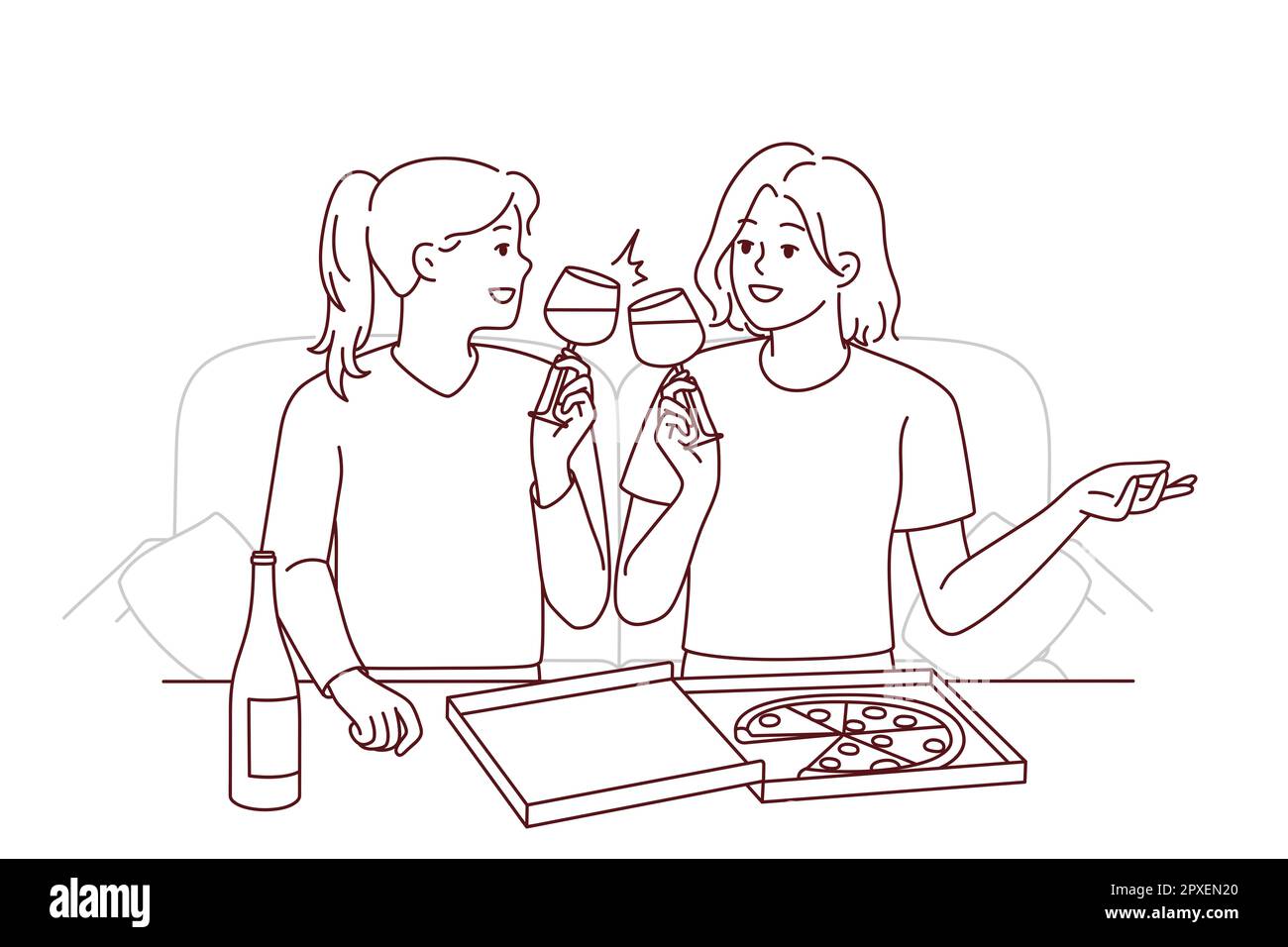 Happy young women sitting on couch at home eating pizza drinking 