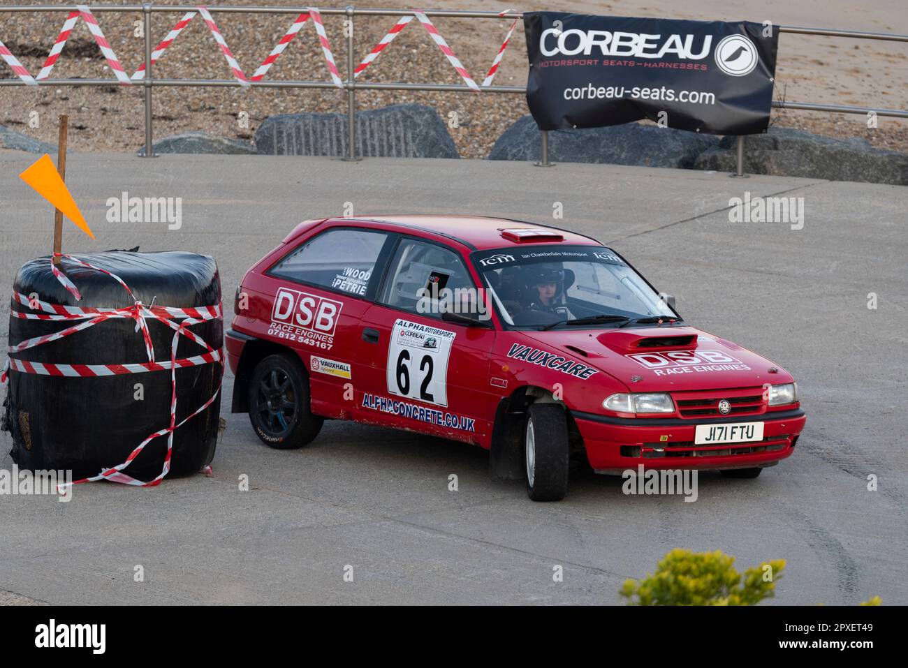 Matt Wood racing a classic 1991 Vauxhall Astra competing in the Corbeau Seats rally on the seafront at Clacton, Essex, UK. Co driver Dan Petrie Stock Photo
