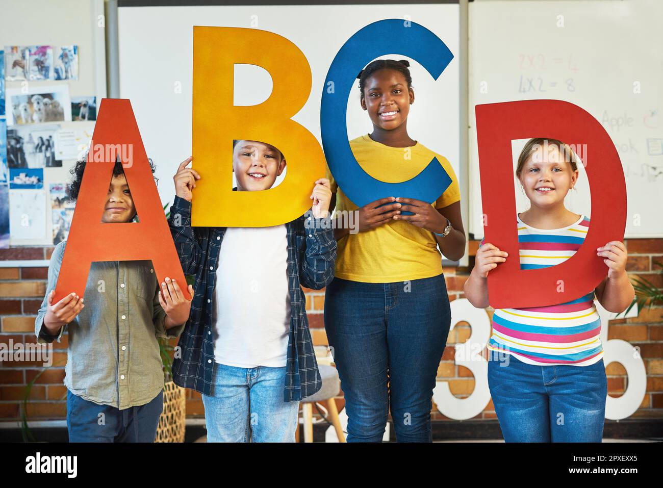 Colour helps children learn better. a diverse group of children ...