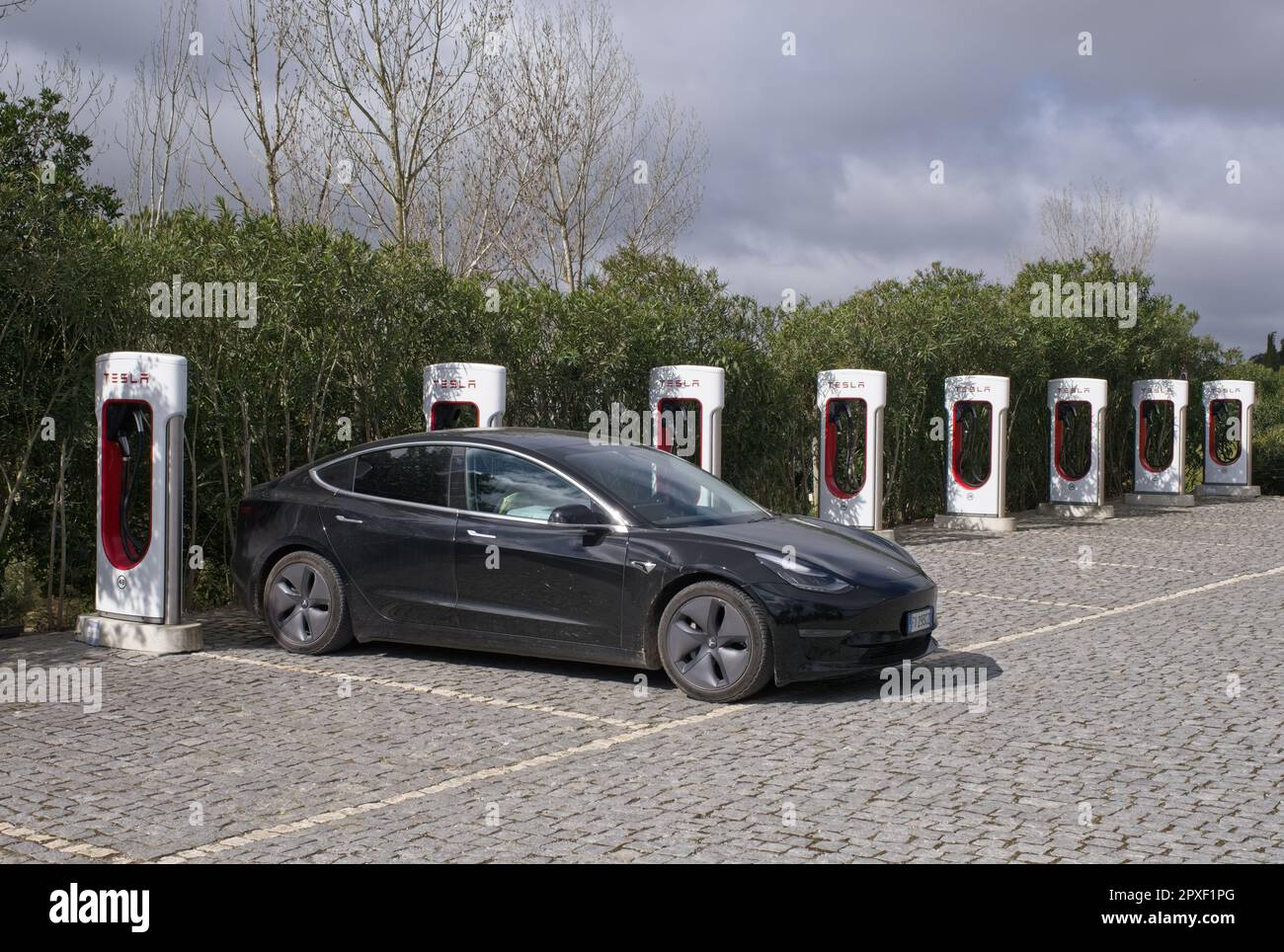 MontemoroNovo, Portugal April 1, 2023 A static shot of a solid black Tesla Model 3 dual