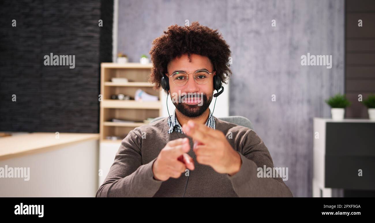 African American Deaf Man Using Sign Language Stock Photo