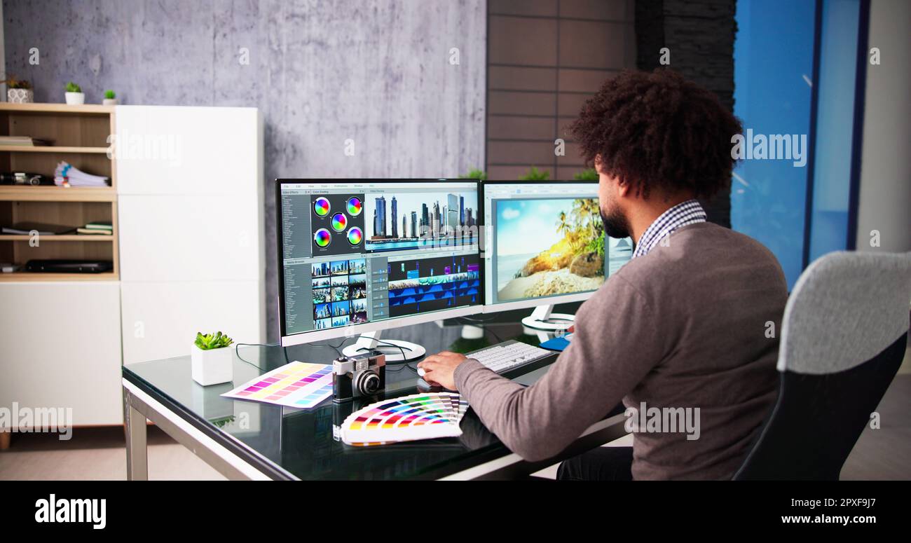 Editor Worker Computer African American Video Editor Tech Job Using Computer Stock Photo - Alamy