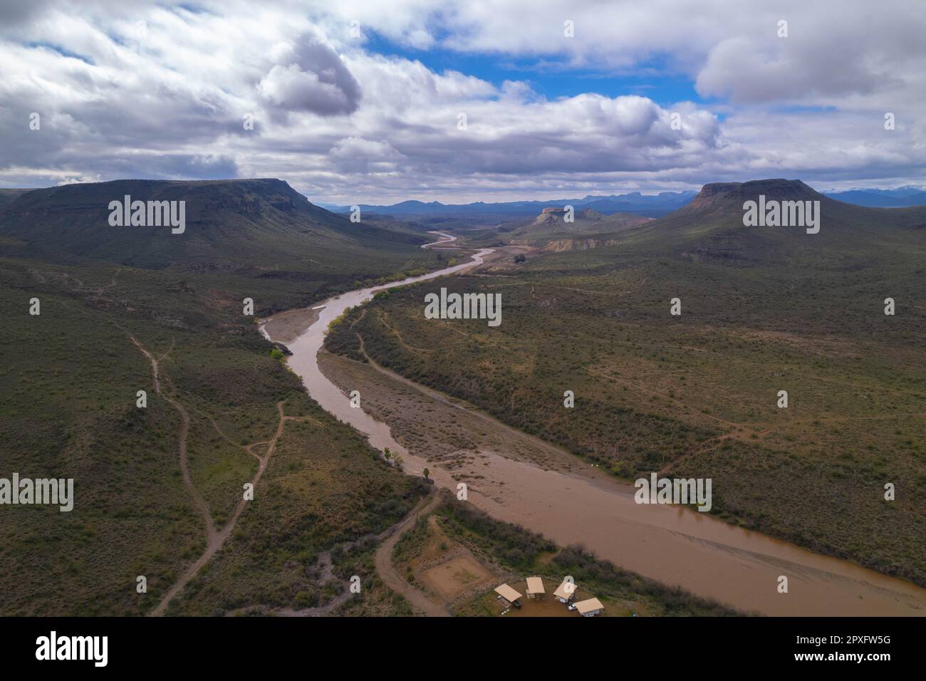 A tranquil scene of the Agua Fria River flowing peacefully after a winter storm Stock Photo