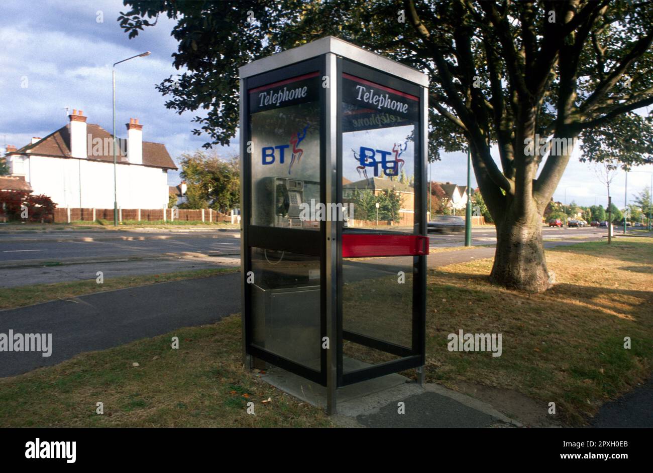 British Telecom (BT) Telephone Box on the Side of the Road Surrey England Stock Photo