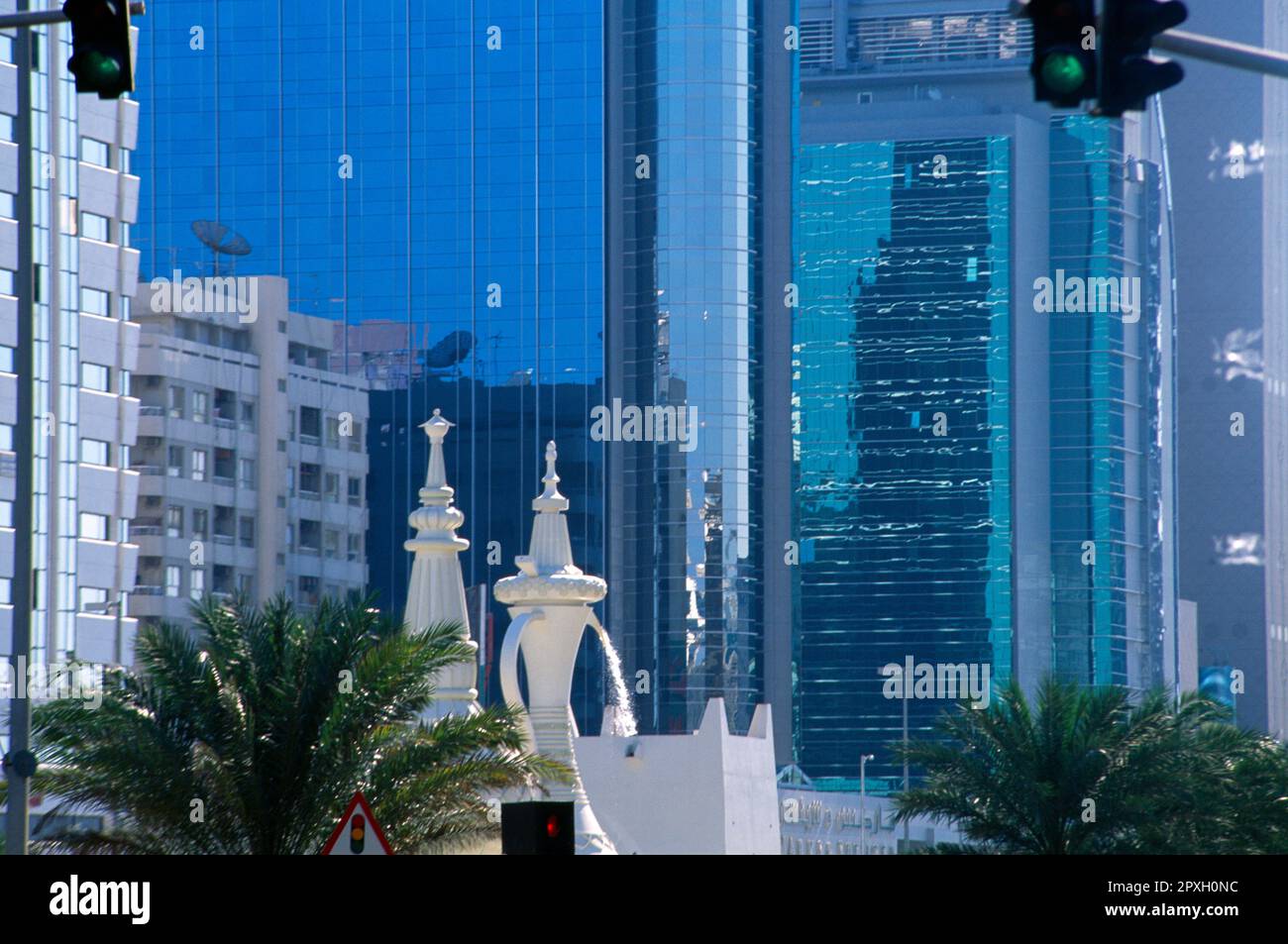 Abu Dhabi UAE Glass Buildings Coffee Pots And Traffic Lights Stock