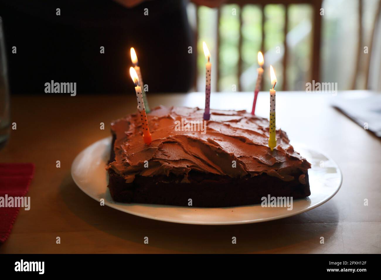 Homemade Chocolate Birthday Cake with Birthday Candles Stock Photo - Alamy