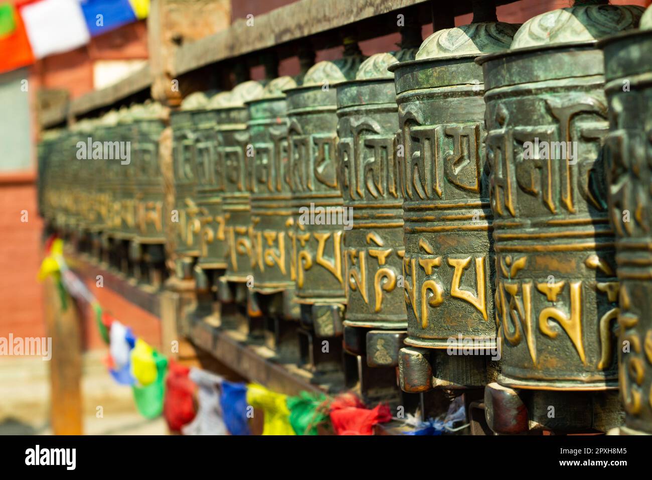 Buddhist prayer wheels Stock Photo Alamy