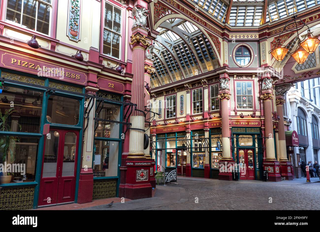 Shops, cafes, restaurants in 14th century Leadenhall market with ornate ...
