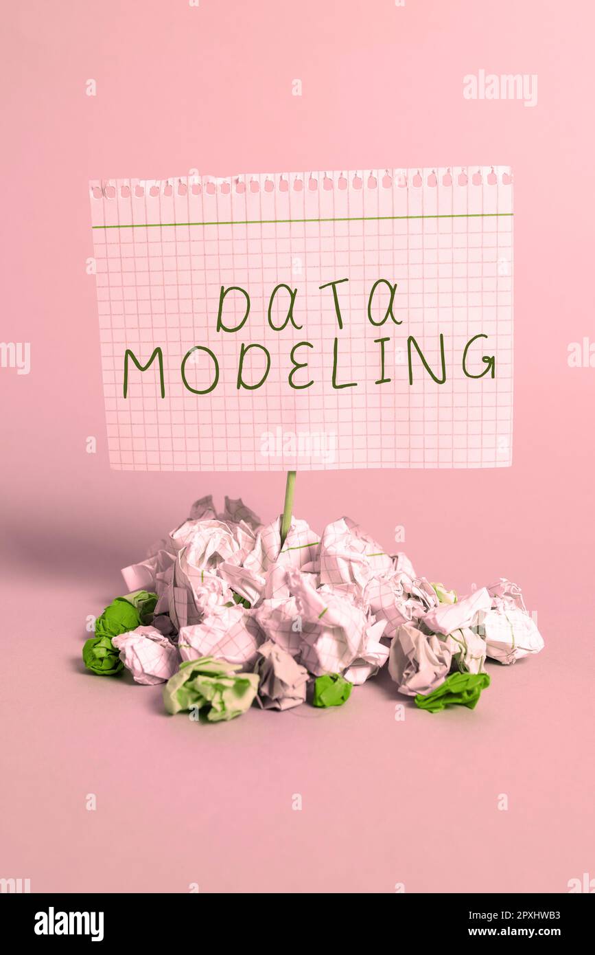 Text caption presenting Data Modeling, Business overview process of transferring data between data storage systems Stock Photo