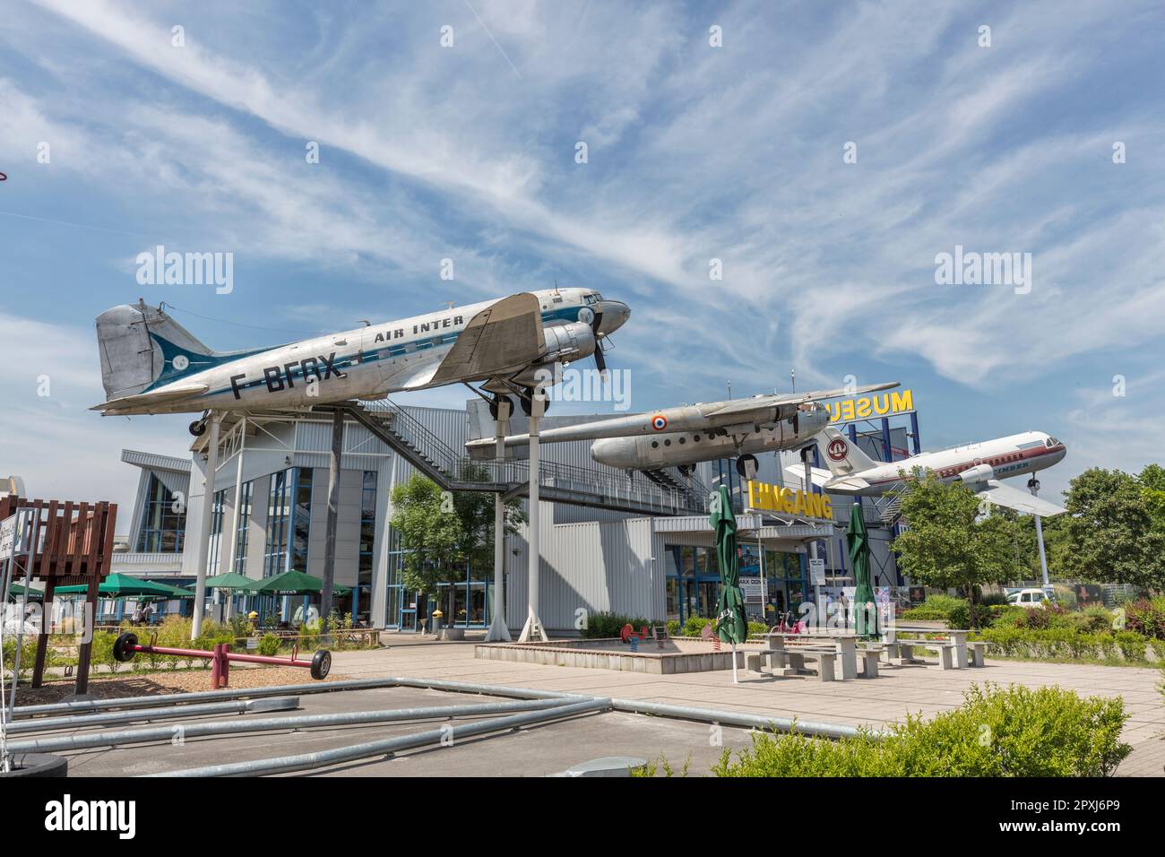 Entrance to the Technik Museum Speyer - technical museum. Left to right. Air Inter Douglas DC-3C, Nord Noratlas, VFW-Fokker 614. Speyer, Germany. Stock Photo
