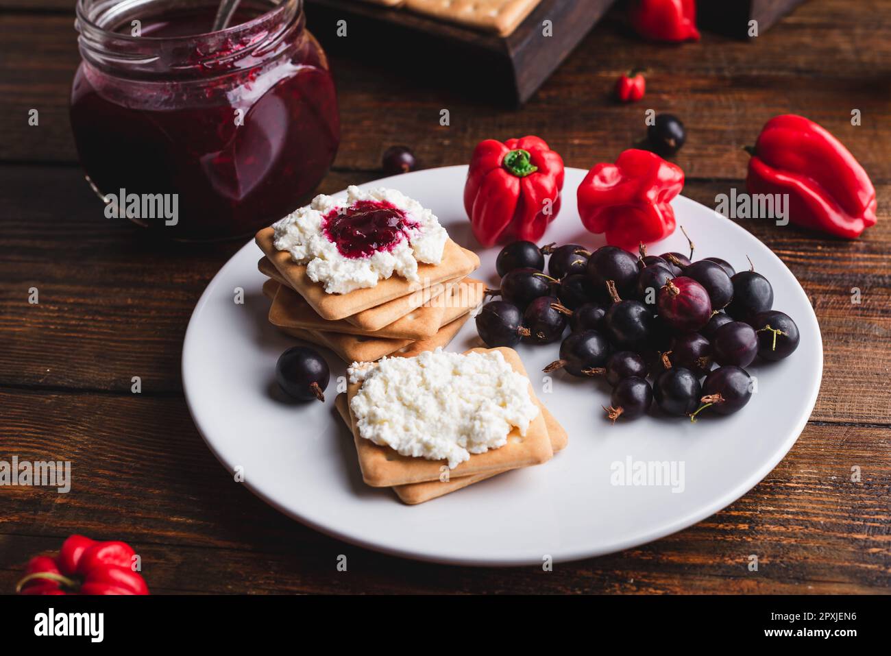 Crackers with Gooseberry and Red Habanero Pepper Jam and Ricotta Cheese