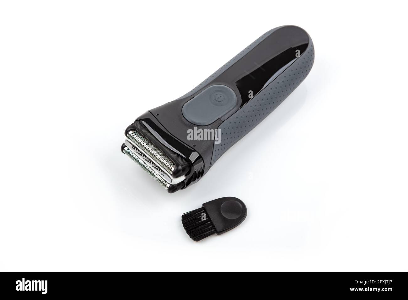 Electric Shaver with brush over bright background Stock Photo