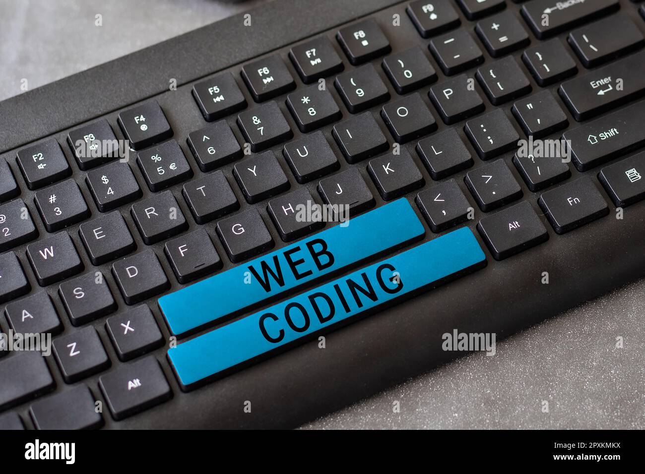 Sign displaying Web Coding, Conceptual photo work involved in developing a web site for the Internet Stock Photo