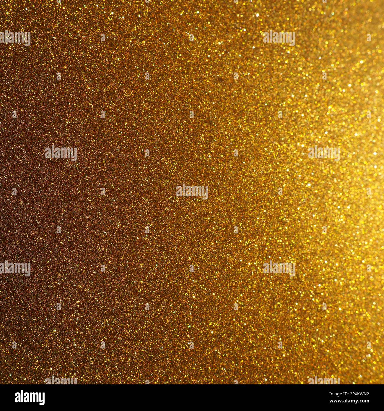Bokeh light of gold glitters. Golden glitter texture background