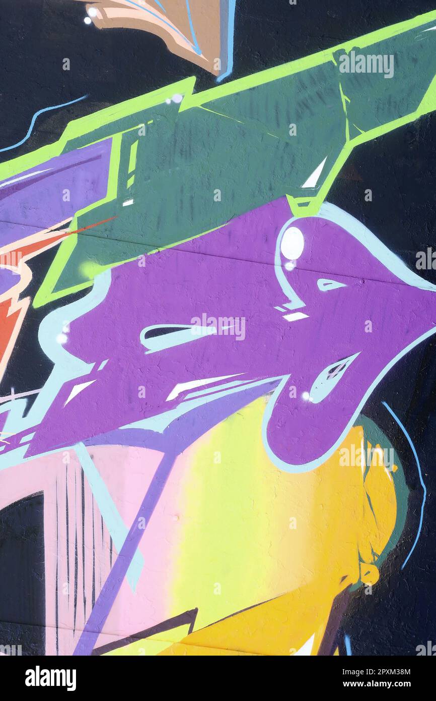 Colorful background of graffiti painting artwork with bright aerosol