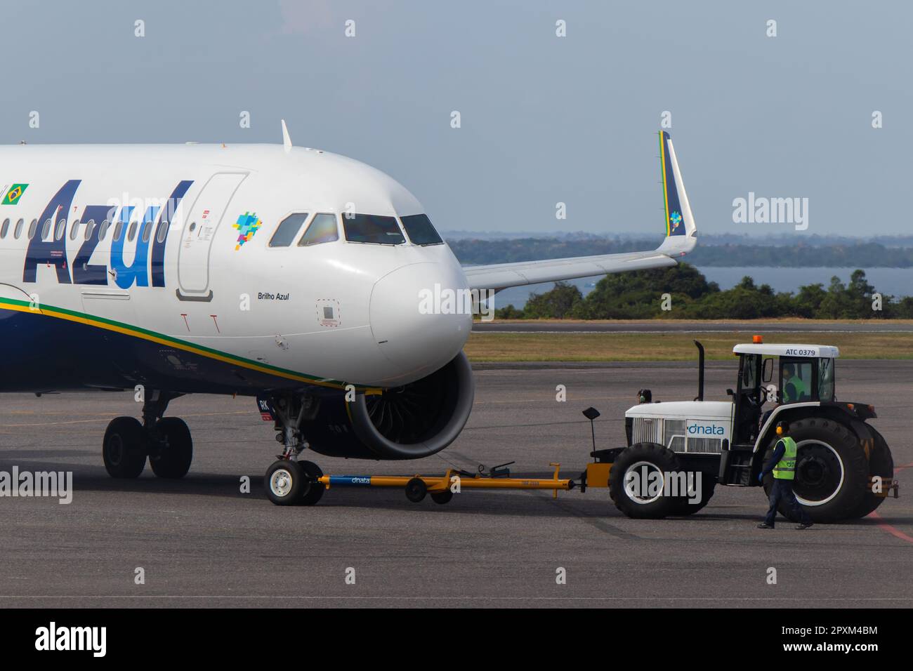 Pushback service on a Azul Brazilian Airlines aircraft performed by a Dnata tractor at Santarem Airport (SBSN) Stock Photo