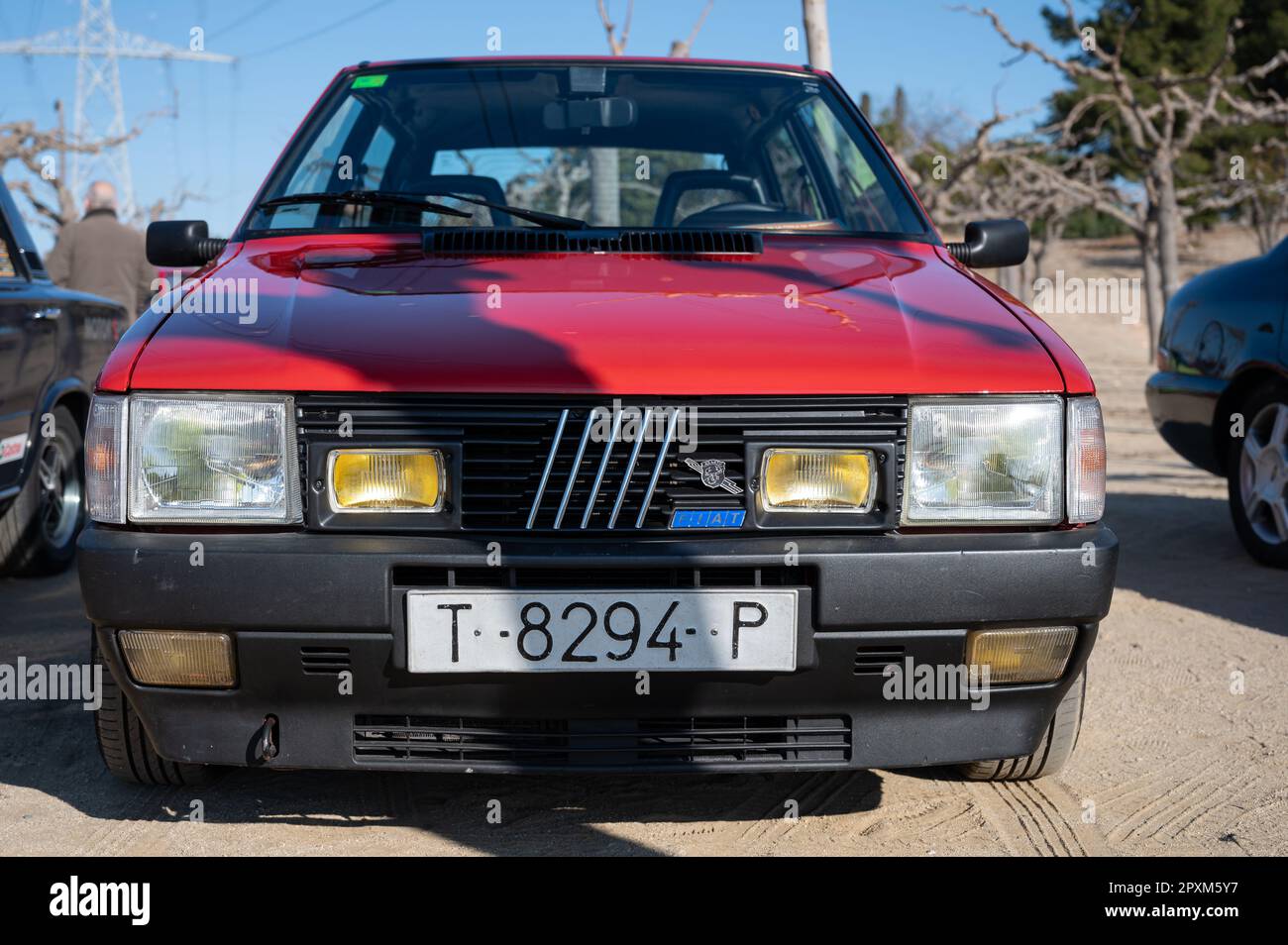 Detail of a small Italian sports car from the 80-90s. It is a red Fiat Uno  Turbo Stock Photo - Alamy