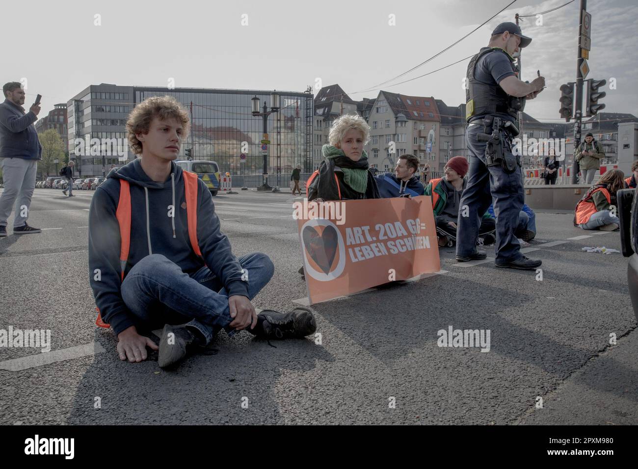 Berlin, Germany. May 2, 2023, Berlin, Germany: On Tuesday morning, May 2, 2023, the climate activist group 'Last Generation' once again blocked several streets in Berlin. The actions led to significant disruptions and traffic jams throughout the city. Several major roads and intersections were affected. The roadblocks have sparked controversy and anger from members of the public who view them as a disruption to daily life and a violation of their rights to free movement. Credit: ZUMA Press, Inc./Alamy Live News Stock Photo