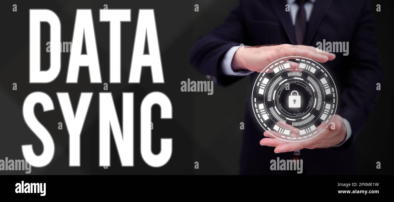 Conceptual display Data Sync, Word Written on data that is continuously generated by different sources Stock Photo