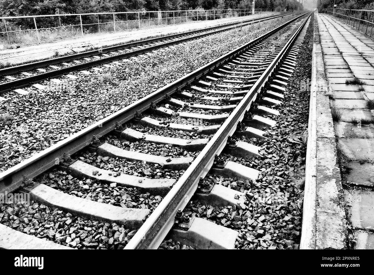 Train Tracks On Gravel Road Black And White Stock Photos Images Alamy