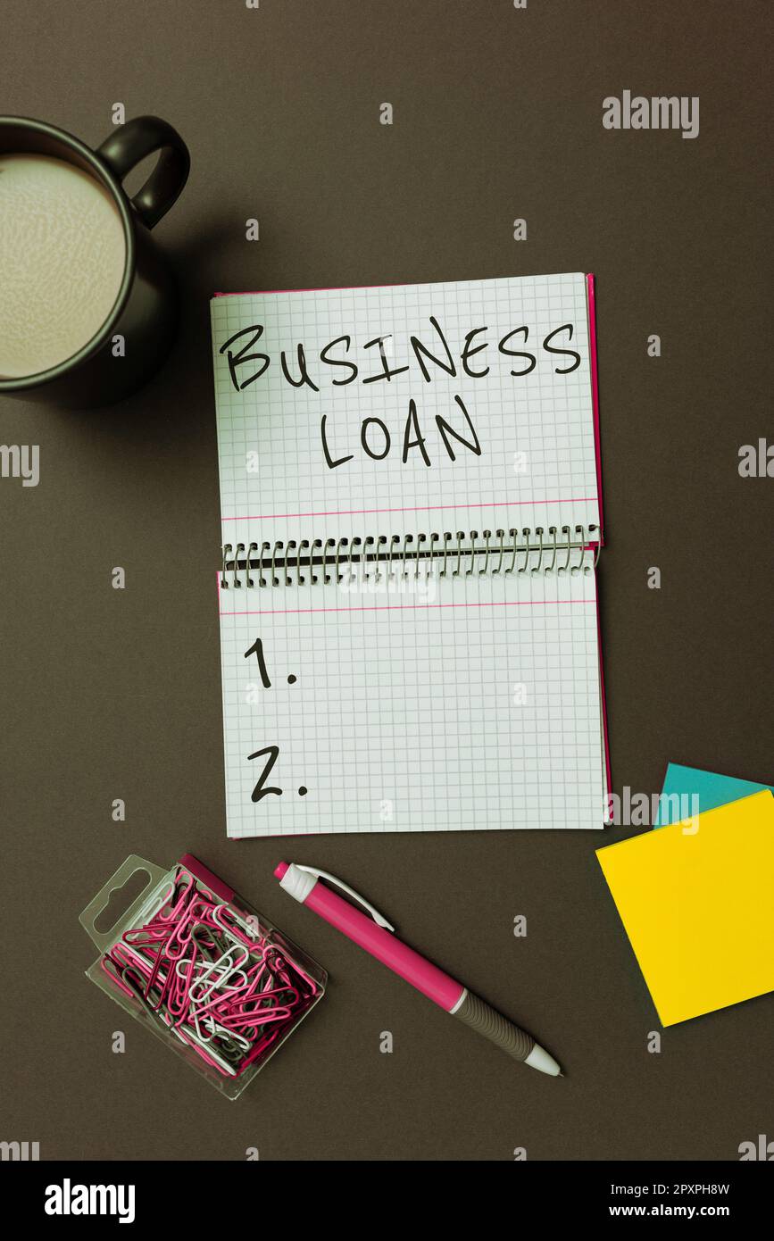 Sign displaying Business Loan, Business concept Credit Mortgage Financial Assistance Cash Advances Debt Stock Photo