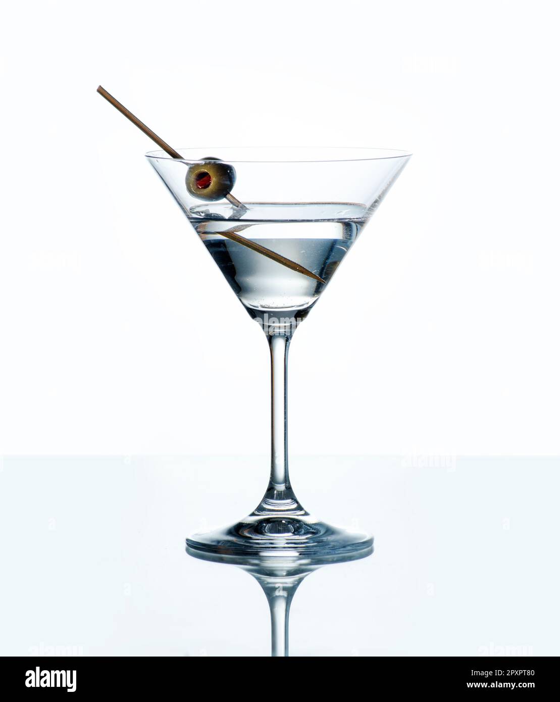 Martini Bianco with olives in a cocktail glass, isolated on white Stock  Photo - Alamy