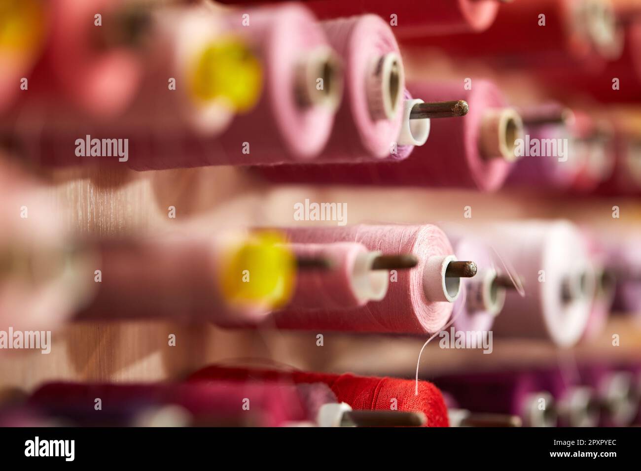 Thread rolls in textile industry hi-res stock photography and images ...